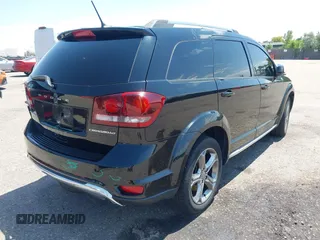 2017 Dodge Journey Crossroad Plus with VIN 3C4PDCGG6HT557145, listed as a IAAI auction lot 42587564 with 176,189 mi miles and . Bid and sale history available at DreamBid. Image 4.