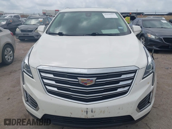 2019 Cadillac XT5 Luxury FWD z VIN 1GYKNCRSXKZ286643, wystawiony jako IAAI lot #42129213 z przebiegiem 87 091 mil mil oraz . Historia ofert i sprzedaży dostępna na DreamBid. Obrazek 12.