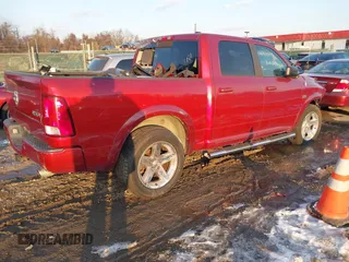 2012 Ram 1500 Sport with VIN 1C6RD7MT1CS225018, listed as a IAAI auction lot 41418493 with 141,526 mi miles. Bid and sale history available at carsss.com. Image 4.