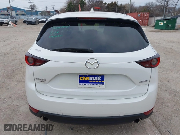 2018 Mazda CX-5 Touring z VIN JM3KFBCM6J0323107, wystawiony jako IAAI lot #41895519 z przebiegiem 86 124 mil mil oraz . Historia ofert i sprzedaży dostępna na DreamBid. Obrazek 16.