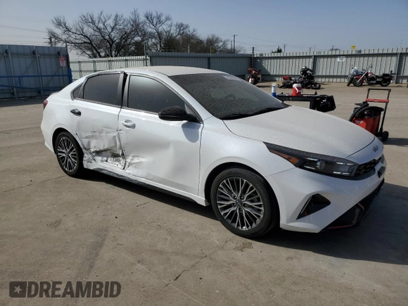 2023 Kia Forte GT-Line with VIN 3KPF54AD9PE651567, listed as a Copart auction lot 49328685 with 23,400 mi miles and Salvage Title. Bid and sale history available at carsss.com. Image 4.