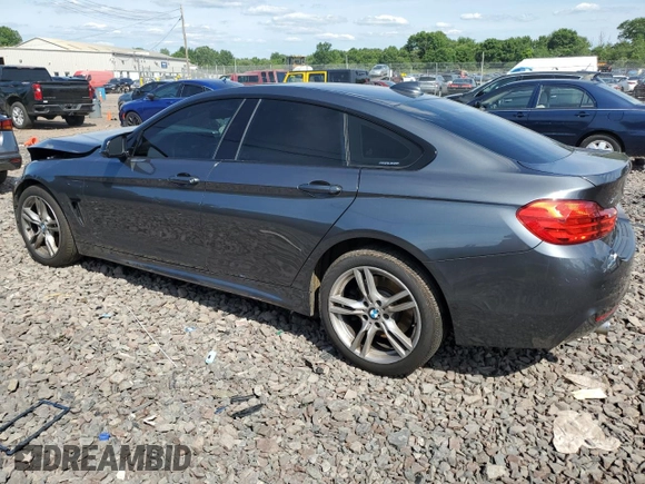 2015 BMW 4 Series 435i xDrive with VIN WBA4B3C51FGV48297, listed as a Copart auction lot 60950394 with 105,509 mi miles and Salvage Title. Bid and sale history available at DreamBid. Image 2.