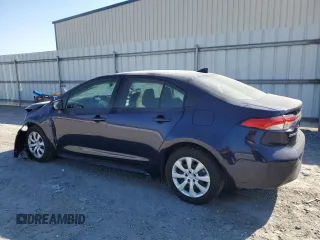 2023 Toyota Corolla Hybrid LE with VIN JTDBCMFE0PJ008775, listed as a Copart auction lot 46623435 with 51,659 mi miles and Salvage Title. Bid and sale history available at carsss.com. Image 2.