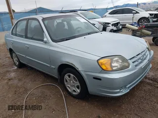 2003 Hyundai Accent GL with VIN KMHCG45C43U465523, listed as a IAAI auction lot 40883056 with 95,770 mi miles. Bid and sale history available at carsss.com. Image 1.