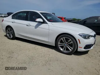 2018 BMW 3 Series 330i xDrive with VIN WBA8D9G56JNU71570, listed as a Copart auction lot 54071565 with 73,305 mi miles and Salvage title. Bid and sale history available at DreamBid. Image 4.