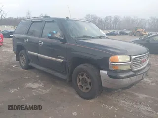 2005 GMC Yukon SLT with VIN 1GKEK13Z45R270890, listed as a IAAI auction lot 41606845 with 233,652 mi miles. Bid and sale history available at carsss.com. Image 1.