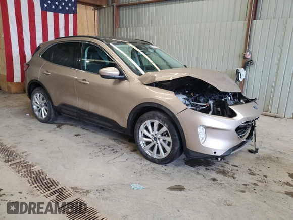2021 Ford Escape Titanium with VIN 1FMCU9J90MUB15582, listed as a Copart auction lot 50982955 with 27,041 mi miles and Salvage Title. Bid and sale history available at carsss.com. Image 4.