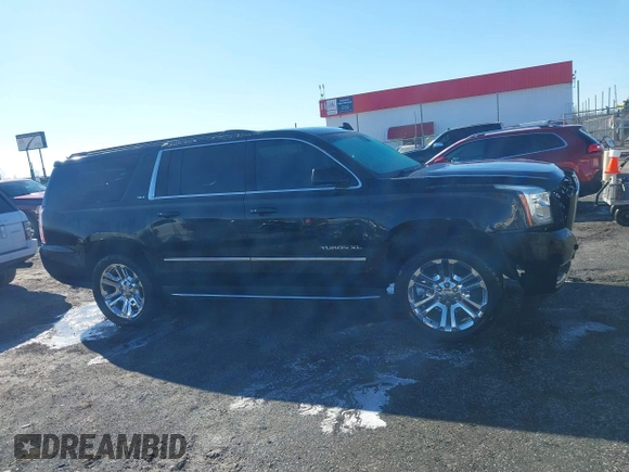 2016 GMC Yukon XL SLT with VIN 1GKS2GKC0GR443634, listed as a IAAI auction lot 41379064 with 121,744 mi miles. Bid and sale history available at carsss.com. Image 13.