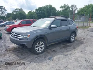 2018 Volkswagen Atlas SE z VIN 1V2CR2CA2JC505488, wystawiony jako IAAI lot #42396518 z przebiegiem 92 806 mil mil oraz . Historia ofert i sprzedaży dostępna na DreamBid. Obrazek 2.
