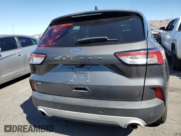 2021 Ford Escape SE with VIN 1FMCU0G63MUA68475, listed as a Copart auction lot 56896515 with 52,758 mi miles and Salvage title. Bid and sale history available at DreamBid. Image 6.