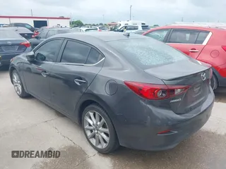2017 Mazda 3 Touring with VIN 3MZBN1V74HM121397, listed as a IAAI auction lot 42143495 with 194,122 mi miles and . Bid and sale history available at DreamBid. Image 3.