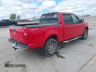 2003 Ford F-150 XLT with VIN 1FTRW08L03KC44731, listed as a IAAI auction lot 42306287 with 139,382 mi miles and . Bid and sale history available at DreamBid. Image 4.