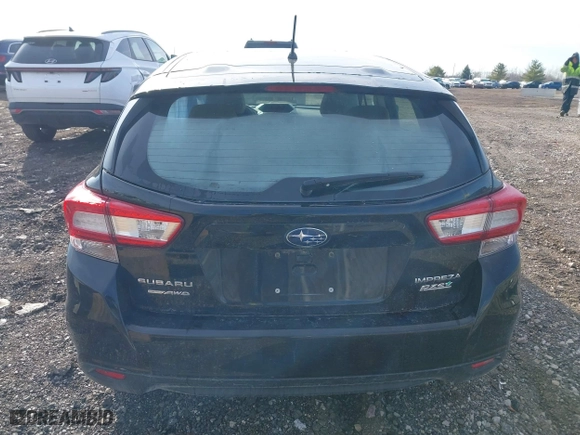 2017 Subaru Impreza with VIN 4S3GTAA60H3746716, listed as a IAAI auction lot 41846153 with 76,704 mi miles. Bid and sale history available at carsss.com. Image 16.