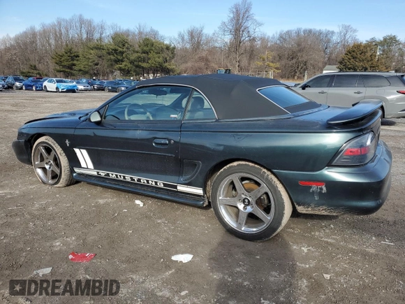 1998 Ford Mustang with VIN 1FAFP4442WF231861, listed as a Copart auction lot 43805205 with 193,569 mi miles and Salvage Title. Bid and sale history available at carsss.com. Image 2.