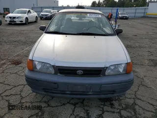 1996 Toyota Tercel DX z VIN JT2AC52L2T0137695, wystawiony jako Copart lot #86535844 z przebiegiem 246 554 mil mil oraz Czysty tytuł • Clean title. Historia ofert i sprzedaży dostępna na DreamBid. Obrazek 5.