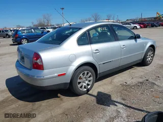 2003 Volkswagen Passat GLS with VIN WVWPD63B43P396108, listed as a IAAI auction lot 41884512 with 87,004 mi miles. Bid and sale history available at carsss.com. Image 4.