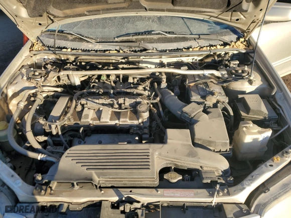 2002 Mazda Protege DX with VIN JM1BJ225420638667, listed as a Copart auction lot 83335814 with 182,368 mi miles and Salvage Title. Bid and sale history available at carsss.com. Image 11.