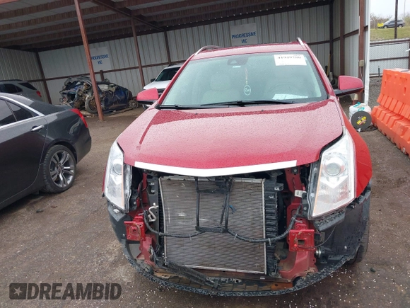 2013 Cadillac SRX Premium Collection with VIN 3GYFNEE3XDS604238, listed as a IAAI auction lot 41949780 with 71,563 mi miles and . Bid and sale history available at DreamBid. Image 13.