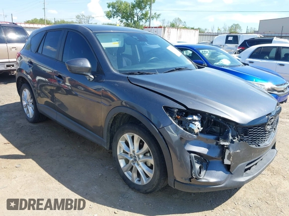 2014 Mazda CX-5 Grand Touring with VIN JM3KE2DY8E0383206, listed as a IAAI auction lot 40205756 with 120,231 mi miles. Bid and sale history available at carsss.com. Image 1.
