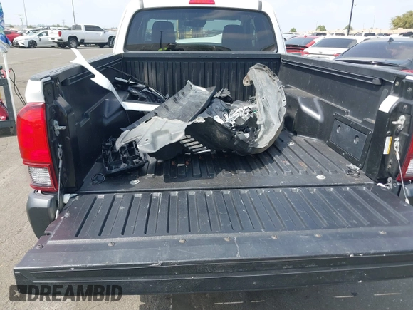 2020 Toyota Tacoma SR with VIN 3TYRX5GN0LT001284, listed as a IAAI auction lot 41888761 with 52,466 mi miles and . Bid and sale history available at DreamBid. Image 12.