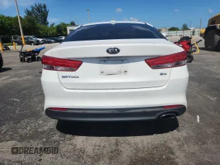 2017 Kia Optima EX с VIN 5XXGU4L32HG126726, выставлен на аукционе Copart как лот 61028895 с пробегом 77 148 миль миль и Списание • Salvage title. История ставок и продаж доступна на DreamBid. Изображение 6.