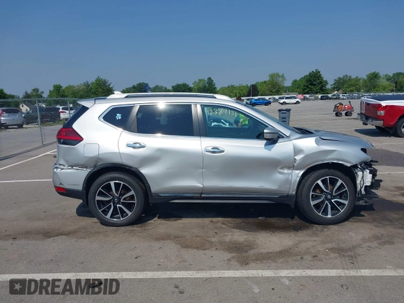 2017 Nissan Rogue SV with VIN 5N1AT2MV0HC832876, listed as a IAAI auction lot 42389131 with 73,856 mi miles and . Bid and sale history available at DreamBid. Image 14.