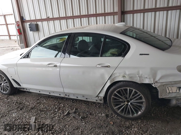 2018 BMW 5 Series 530e with VIN WBAJA9C57JB034128, listed as a IAAI auction lot 41800329 with 66,684 mi miles and . Bid and sale history available at DreamBid. Image 15.