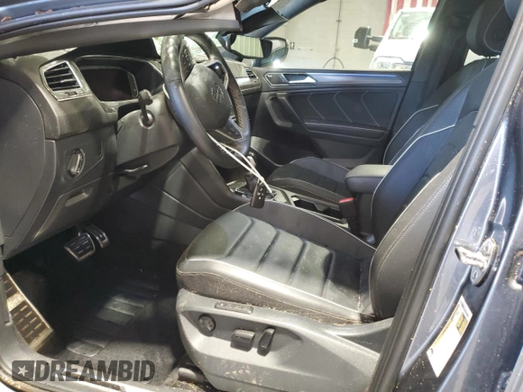 2023 Volkswagen Tiguan SEL R-Line with VIN 3VV4B7AX3PM072402, listed as a Copart auction lot 56656515 with 13,686 mi miles and Salvage title. Bid and sale history available at DreamBid. Image 7.