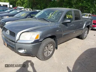 2008 Mitsubishi Raider LS z VIN 1Z7HC28K68S619590, wystawiony jako IAAI lot #42305142 z przebiegiem 185 622 mil mil oraz . Historia ofert i sprzedaży dostępna na DreamBid. Obrazek 2.