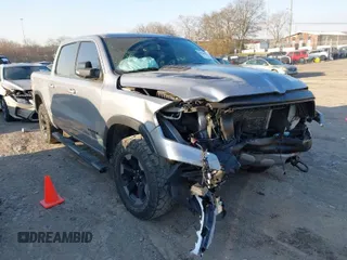 2019 Ram 1500 Rebel z VIN 1C6SRFLT9KN742546, wystawiony jako IAAI lot #41760867 z przebiegiem 82 569 mil mil oraz . Historia ofert i sprzedaży dostępna na DreamBid. Obrazek 1.