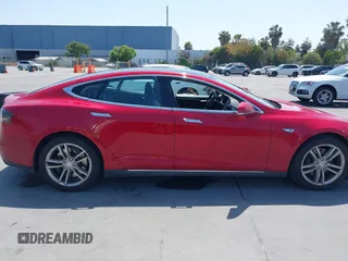 2014 Tesla Model S 60 with VIN 5YJSA1S11EFP33278, listed as a IAAI auction lot 42441781 with Not provided miles and . Bid and sale history available at DreamBid. Image 13.