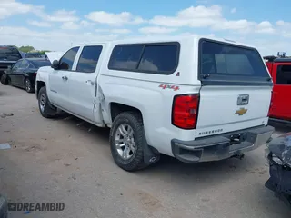 2014 Chevrolet Silverado 1500 LT with VIN 3GCUKREH6EG348306, listed as a IAAI auction lot 42025961 with 144,893 mi miles. Bid and sale history available at carsss.com. Image 3.