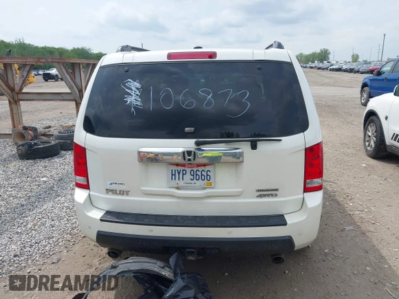 2011 Honda Pilot Touring z VIN 5FNYF4H96BB106873, wystawiony jako IAAI lot #42154795 z przebiegiem 162 282 mil mil oraz . Historia ofert i sprzedaży dostępna na DreamBid. Obrazek 16.