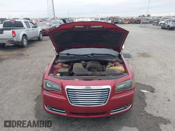 2012 Chrysler 300 Limited z VIN 2C3CCACG7CH250858, wystawiony jako IAAI lot #41709739 z przebiegiem 236 991 mil mil oraz . Historia ofert i sprzedaży dostępna na DreamBid. Obrazek 10.