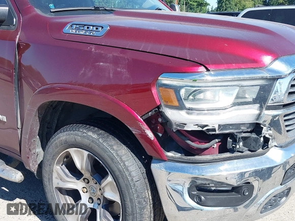 2019 Ram 1500 Laramie with VIN 1C6SRFJT2KN677400, listed as a IAAI auction lot 42441010 with 76,750 mi miles and . Bid and sale history available at DreamBid. Image 6.