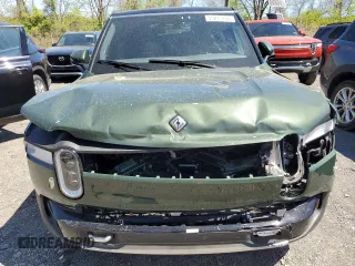 2022 Rivian R1S Launch Edition z VIN 7PDSGABLXNN002875, wystawiony jako Copart lot #55218465 z przebiegiem 25 988 mil mil oraz Szkody całkowita. Historia ofert i sprzedaży dostępna na DreamBid. Obrazek 5.