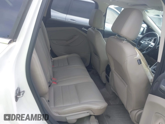 2013 Ford Escape SEL with VIN 1FMCU9H90DUC52981, listed as a IAAI auction lot 42506500 with 74,212 mi miles and . Bid and sale history available at DreamBid. Image 8.