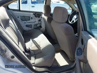 2005 Pontiac Grand Am SE with VIN 1G2NE52E05M215976, listed as a IAAI auction lot 42025657 with 220,418 mi miles. Bid and sale history available at carsss.com. Image 8.