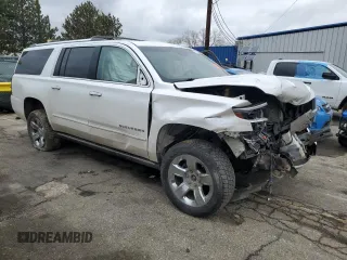 2017 Chevrolet Suburban Premier with VIN 1GNSKJKC6HR305372, listed as a Copart auction lot 47477705 with 141,324 mi miles and Salvage Title. Bid and sale history available at DreamBid. Image 4.