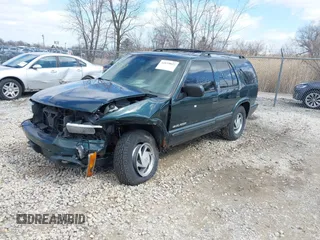2003 Chevrolet Blazer LS z VIN 1GNDT13X93K177170, wystawiony jako IAAI lot #41839837 z przebiegiem 148 555 mil mil oraz . Historia ofert i sprzedaży dostępna na DreamBid. Obrazek 2.