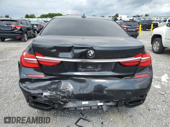 2016 BMW 7 Series 750i with VIN WBA7F0C53GGM20760, listed as a Copart auction lot 57230334 with 77,588 mi miles and Salvage Title. Bid and sale history available at carsss.com. Image 6.