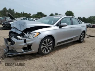 2020 Ford Fusion SE с VIN 3FA6P0T90LR254009, выставлен на аукционе Copart как лот 60367275 с пробегом 42 950 миль миль и Списание • Salvage title. История ставок и продаж доступна на DreamBid. Изображение 1.