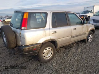 1998 Honda CR-V LX with VIN JHLRD2848WC018898, listed as a IAAI auction lot 41024605 with 246,285 mi miles. Bid and sale history available at carsss.com. Image 4.