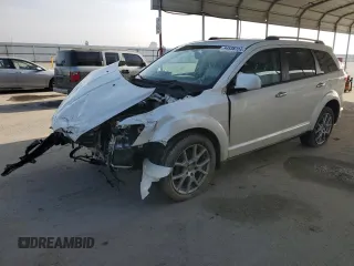 2014 Dodge Journey Limited with VIN 3C4PDCDG8ET170709, listed as a Copart auction lot 84538724 with 147,377 mi miles and Salvage Title. Bid and sale history available at DreamBid. Image 1.