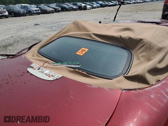1999 Jaguar XK with VIN SAJGX204XXC038435, listed as a Copart auction lot 64843714 with Not Provided miles and Salvage Title. Bid and sale history available at DreamBid. Image 10.