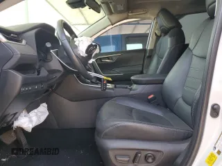 2024 Toyota RAV4 Hybrid XLE Premium with VIN JTMB6RFV6RD120633, listed as a Copart auction lot 57620825 with 28,817 mi miles and Salvage title. Bid and sale history available at DreamBid. Image 7.