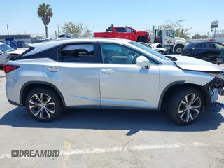 2017 Lexus RX 350 with VIN 2T2ZZMCA9HC081070, listed as a IAAI auction lot 42378070 with 90,810 mi miles and . Bid and sale history available at DreamBid. Image 13.