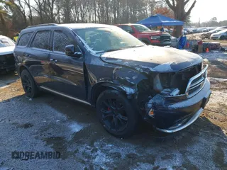 2014 Dodge Durango SXT with VIN 1C4RDHAG5EC369951, listed as a IAAI auction lot 41278358 with 214,453 mi miles and . Bid and sale history available at carsss.com. Image 1.