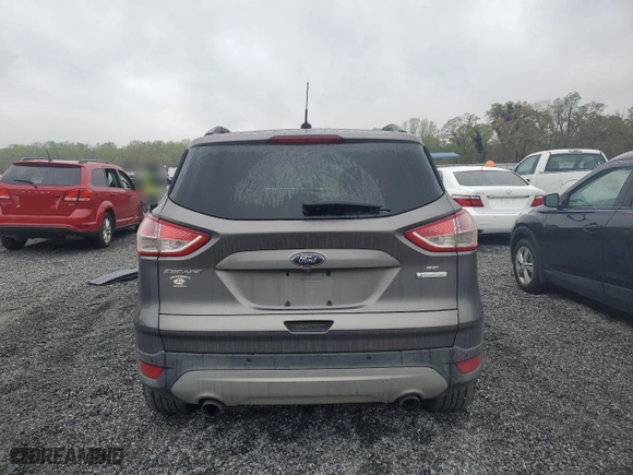 2014 Ford Escape SE with VIN 1FMCU0GX7EUA88805, listed as a Copart auction lot 51124585 with 105,518 mi miles and Salvage Title. Bid and sale history available at carsss.com. Image 6.