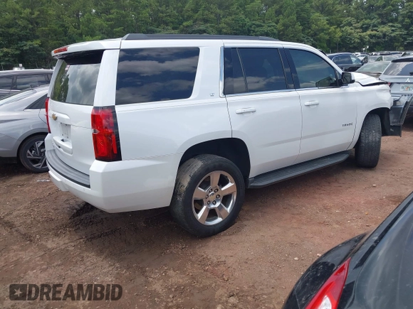 2016 Chevrolet Tahoe LT with VIN 1GNSCBKC9GR459057, listed as a IAAI auction lot 42541097 with 82,203 mi miles and . Bid and sale history available at DreamBid. Image 4.